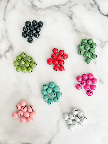 Colorful Christmas jingle bells gift wrapping embellishments, set of 10 shown with 8 different color