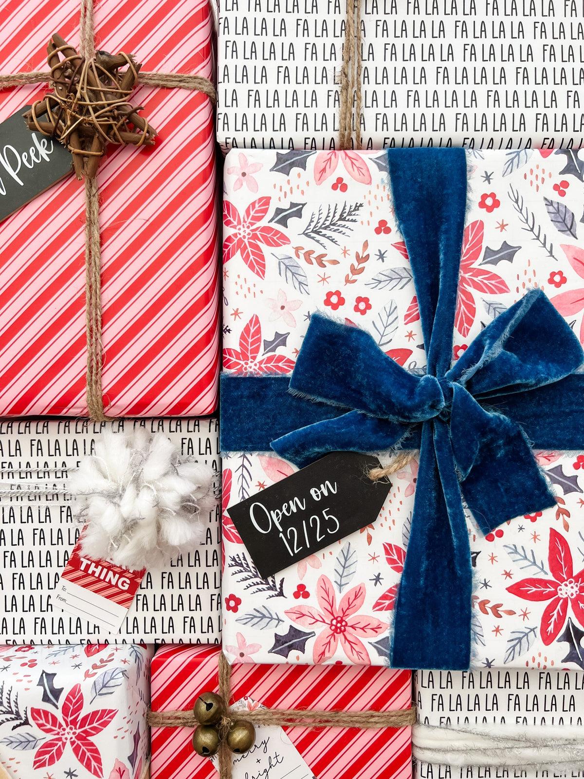 Gift boxes with festive wrapping paper and ribbons