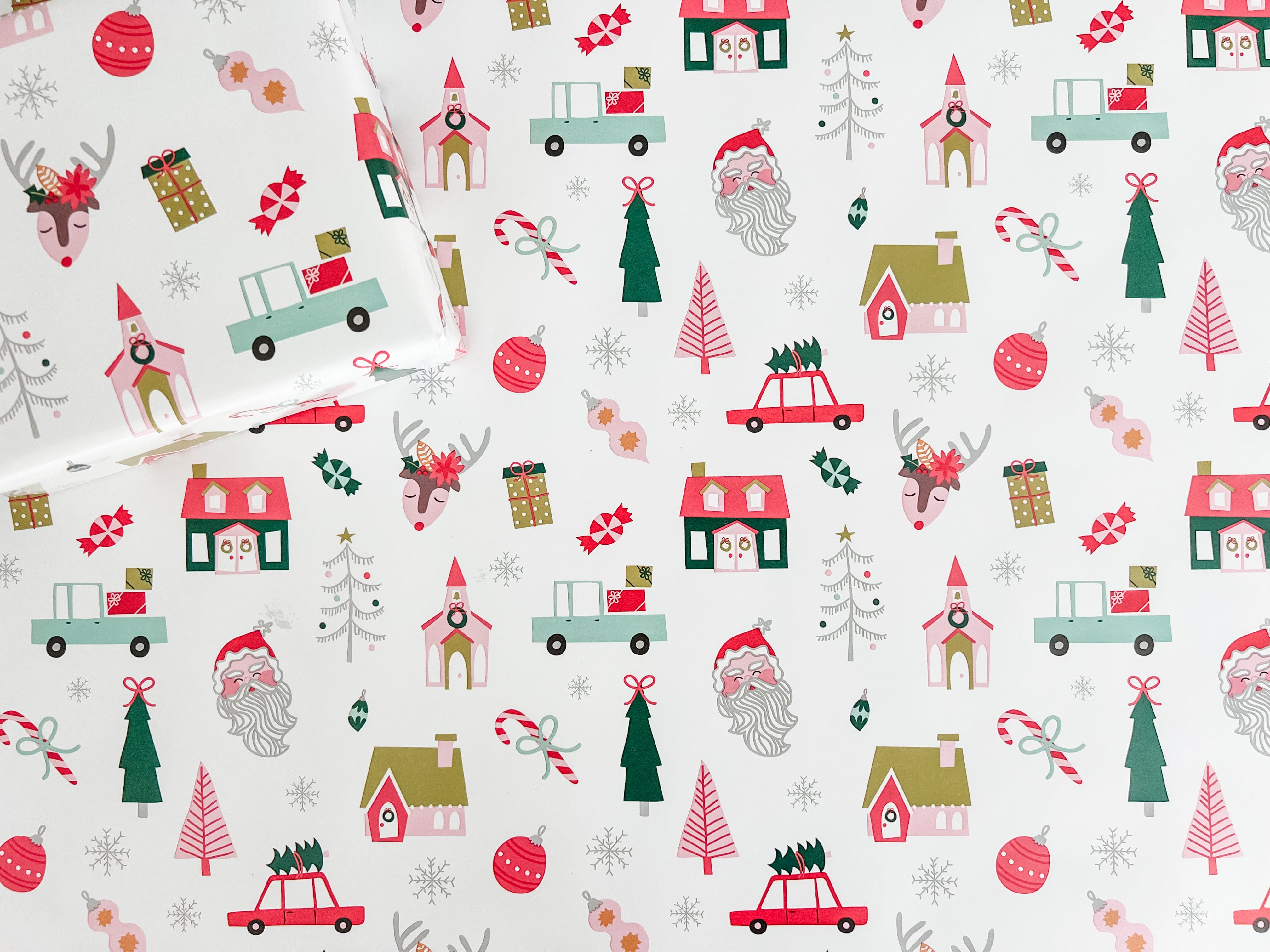 Christmas-themed pattern with Santa Claus, reindeer, and Christmas trees on a white background.