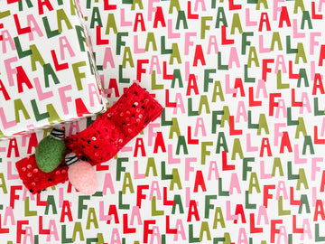 Wrapping paper with colorful Fa La La pattern