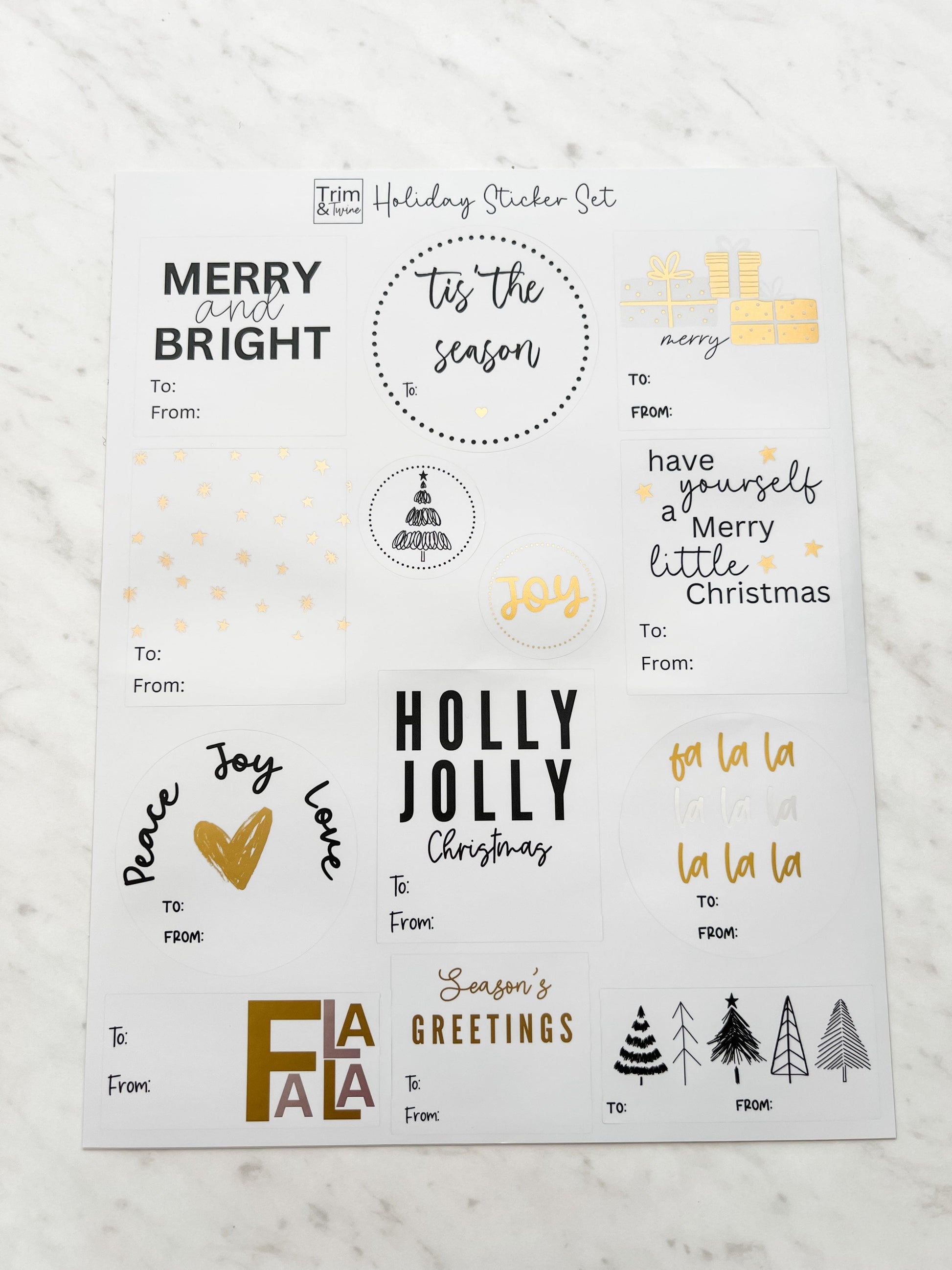 Black and white stickers with gold accents