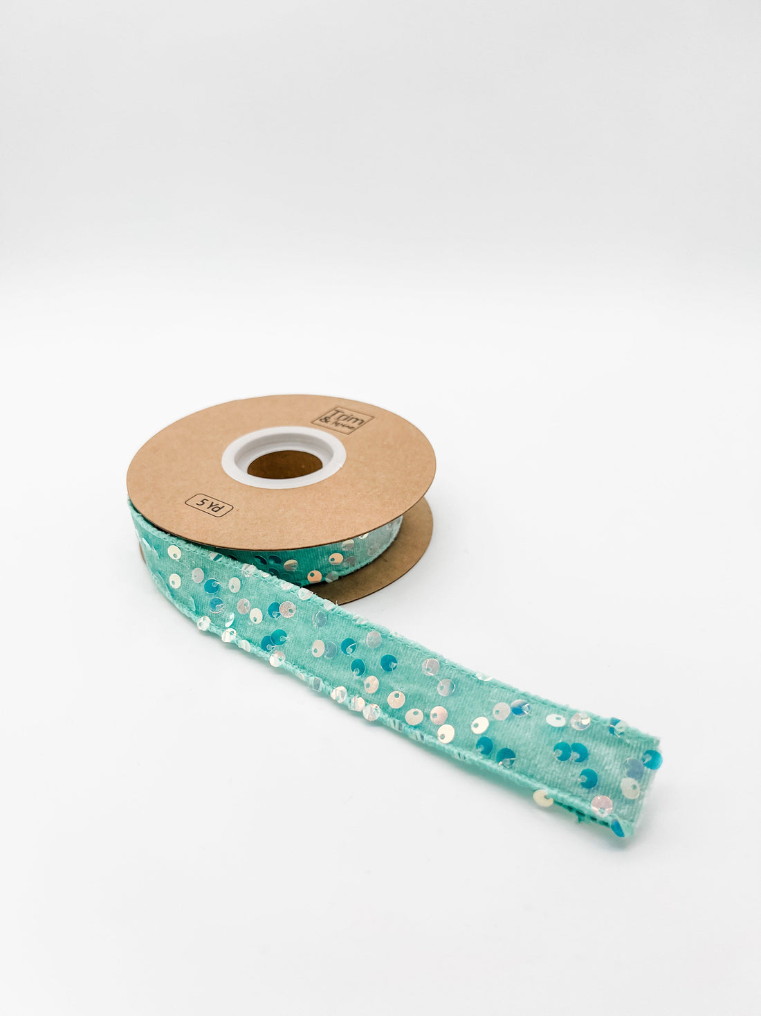 Roll of blue velvet sequined wired ribbon