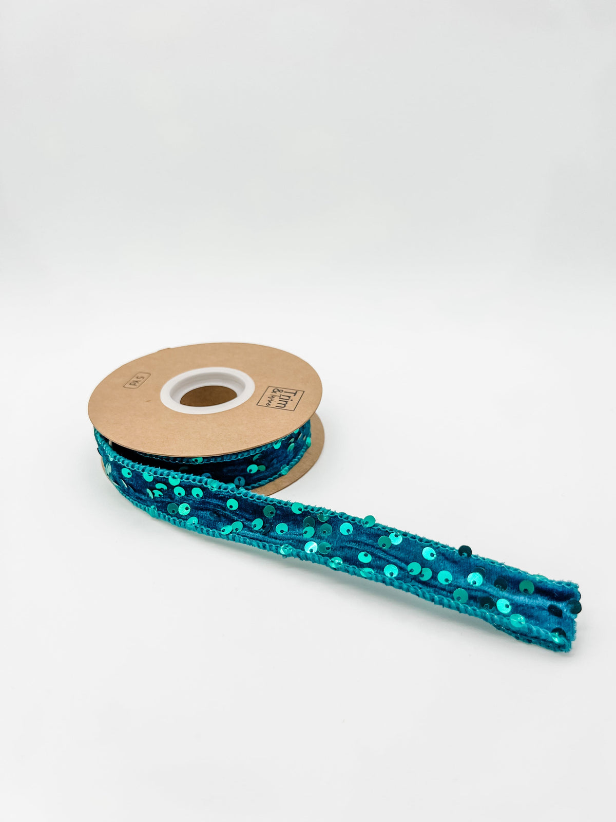 Blue sequin ribbon on a white background