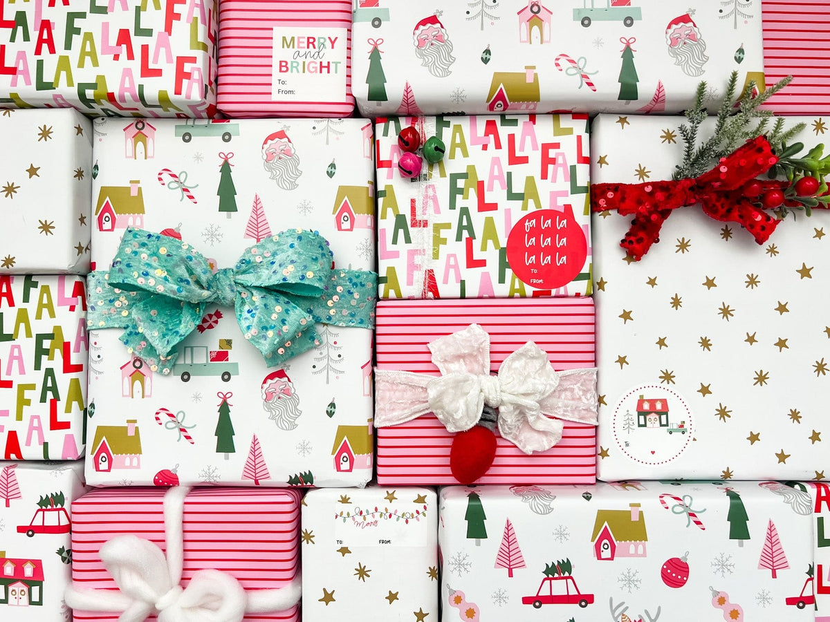 Collection of Christmas-themed gift wrap with various designs and decorative elements.