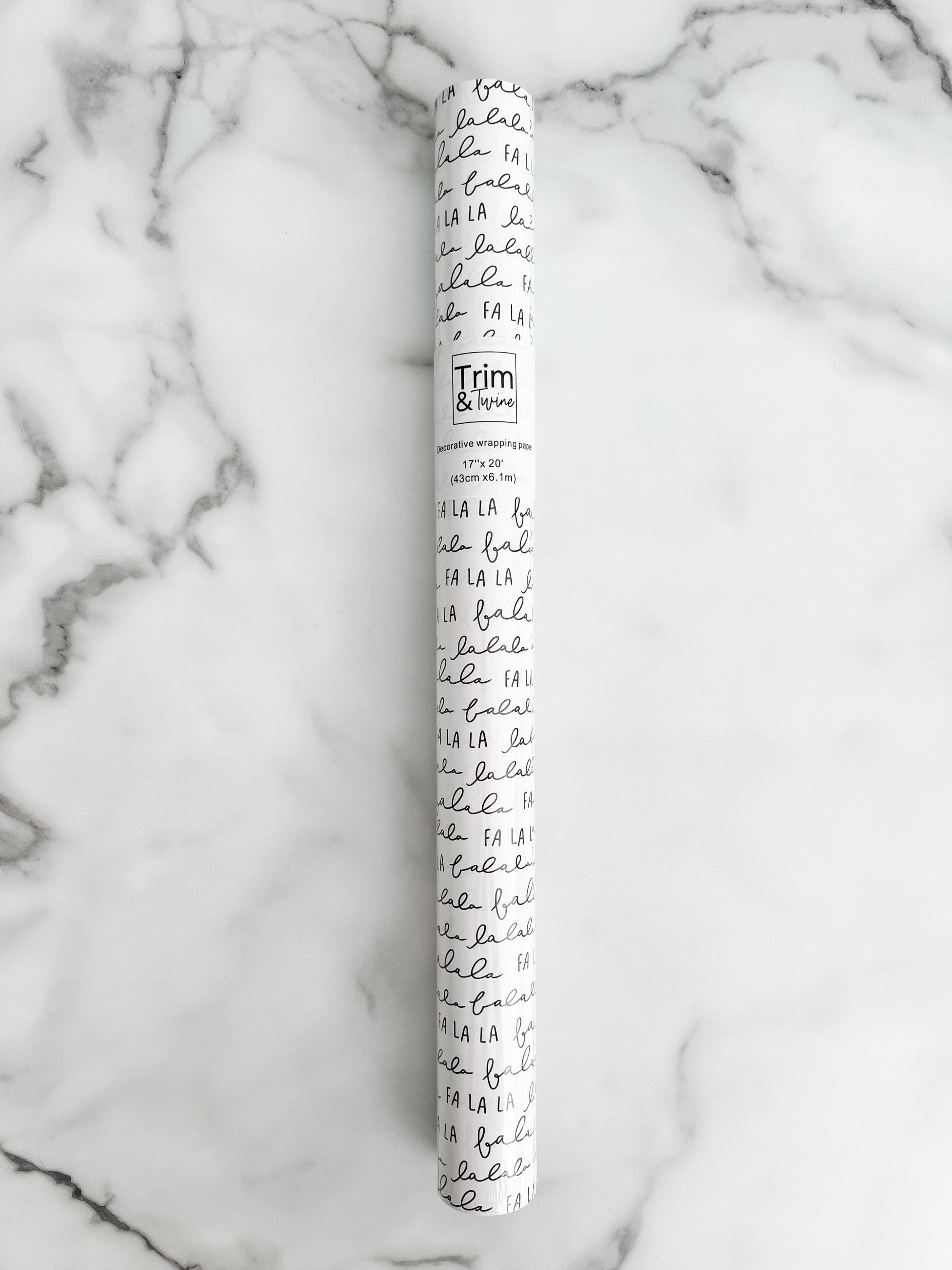 Roll of fa la la wrapping paper
