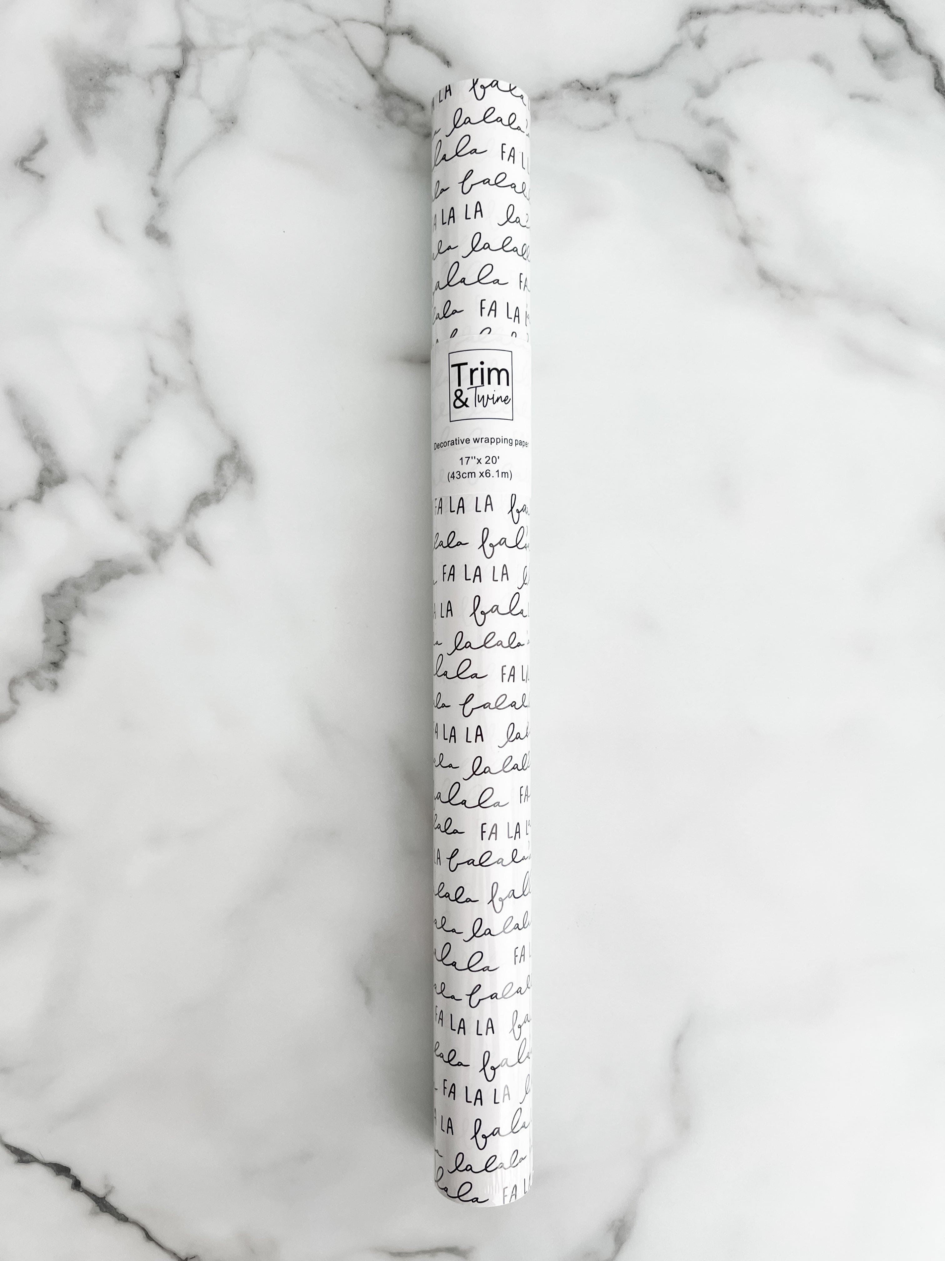 Roll of fa la la wrapping paper