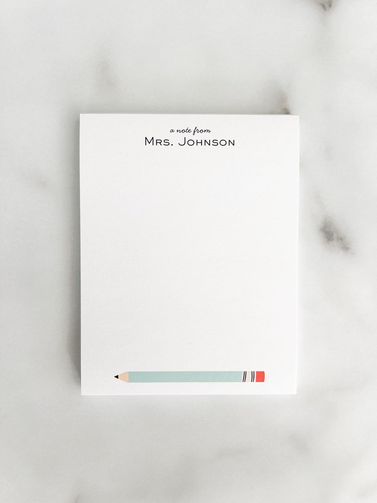 Personalized teacher notepad with a pencil