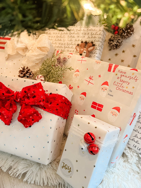 Christmas presents wrapped in festive paper with decorative ribbons and designs.
