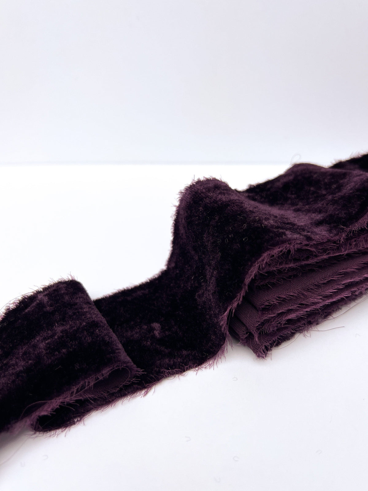 2" plum frayed edge velvet