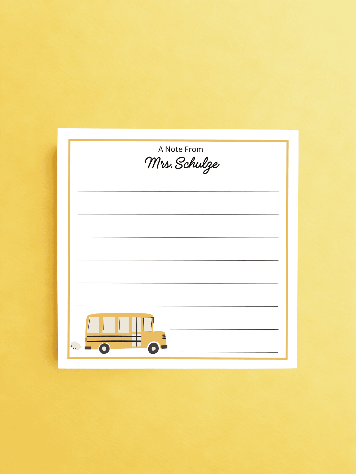 Personalized teacher notepad with lines for writing and a bus